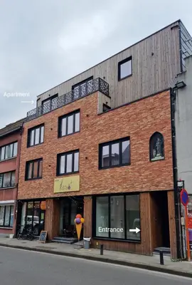 a brick building on the side of a street at Phoenix in Ghent